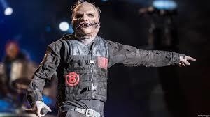 Does the band "Slipknot", use a down-tuned 6 string, or a 7 string guitar-example-1