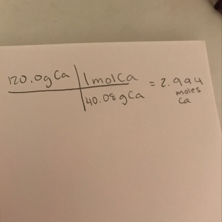 How many moles are present in a 120.0g sample of calcium-example-1