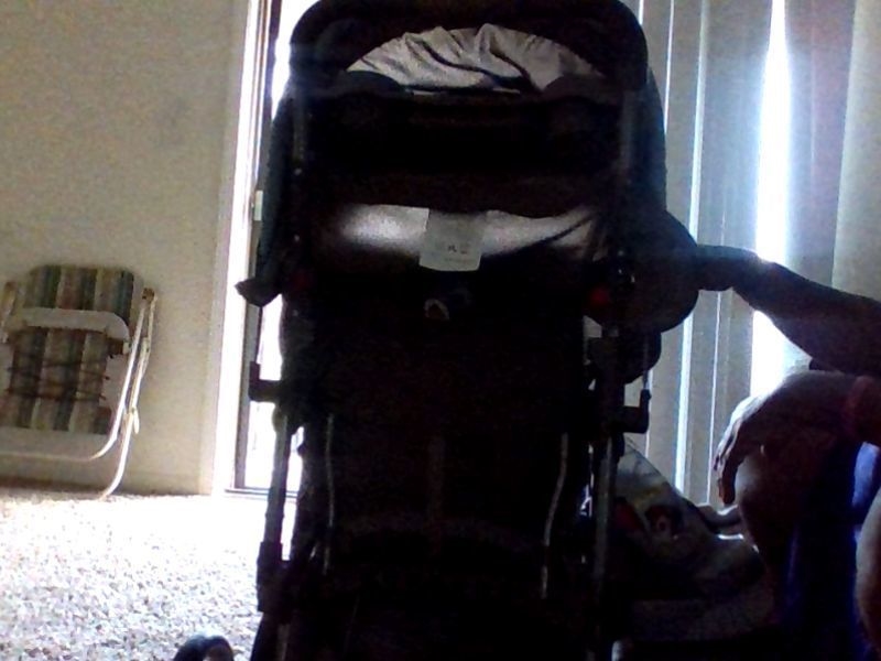 I need an instruction manual on how to open a graco baby stroller? This is the picture-example-1