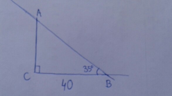 The shadow of a building is 40 ft. long. The angle between the ground and the line-example-1