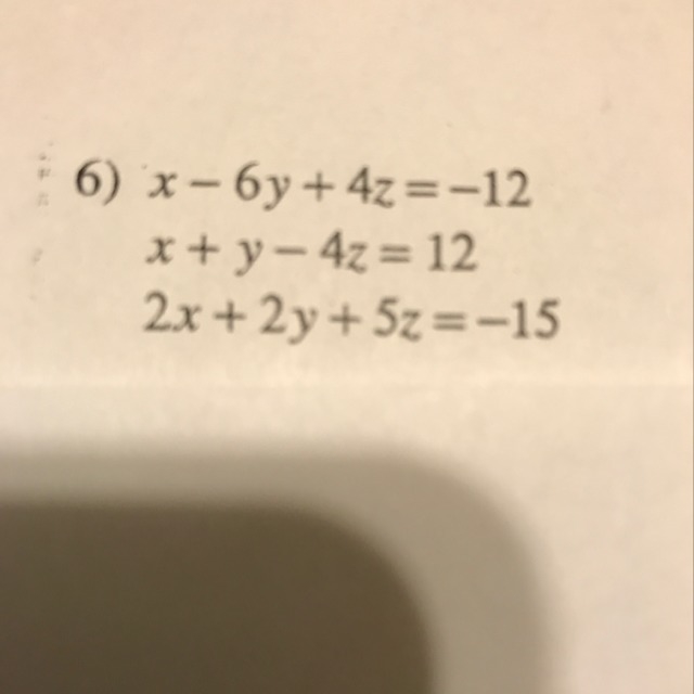 Solving systems of three equations w/ elimination-example-1