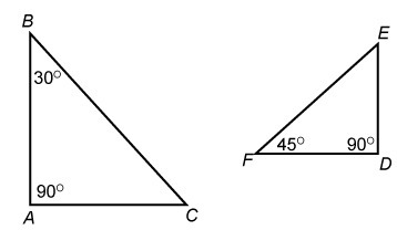 Drag and drop a phrase to make the statement true. TrianglesABC and DEF are A. similar-example-1