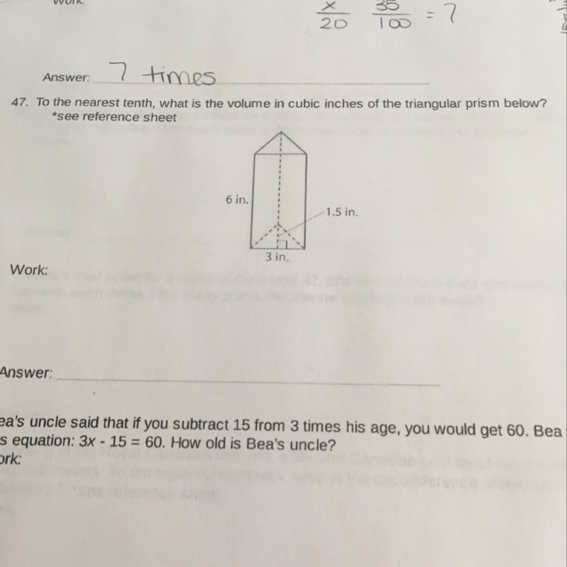 to the nearest tenth, what is the volume in cubic inches of the triangular prism below-example-1