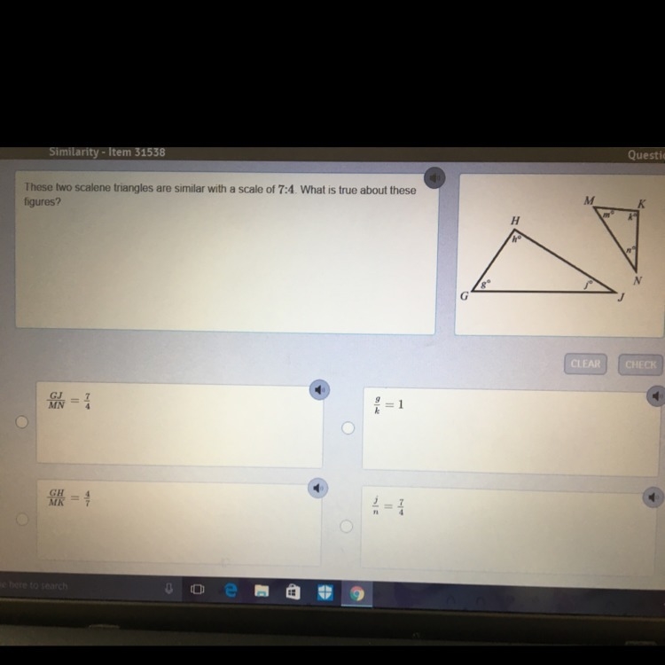 These two scalene triangles are similar with a scale of 7:4 what is true about these-example-1