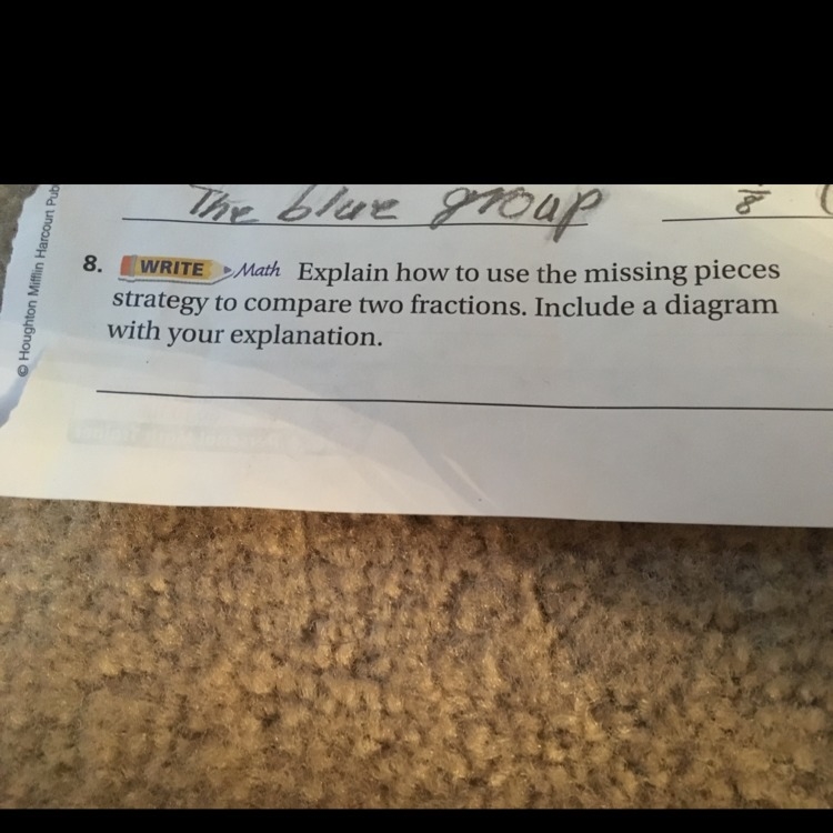 Explain how to use the missing pieces strategy to compare two fractions. Include a-example-1