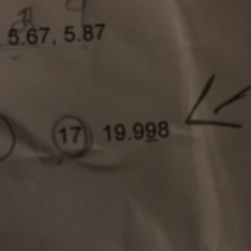 Round each number to the underlined place value-example-1