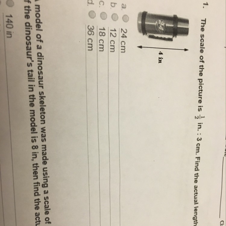 The scale of the picture is 1/2 in 3cm find the actual length of the flask-example-1