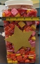 Hey Guys!! I need help big time! How many starburst do you guys think is in this container-example-2