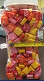 Hey Guys!! I need help big time! How many starburst do you guys think is in this container-example-4