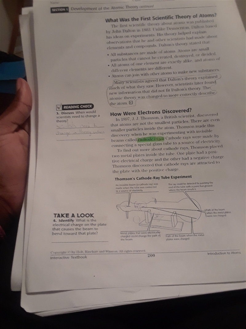 What is the electrical charge on the plate that causes the beam to bend toward the-example-1