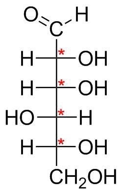 How many asymmetric centers are present in the open chain form of the aldohexose d-example-1