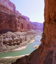 Identify the landform shown in the photo above. What natural forces can create this-example-1