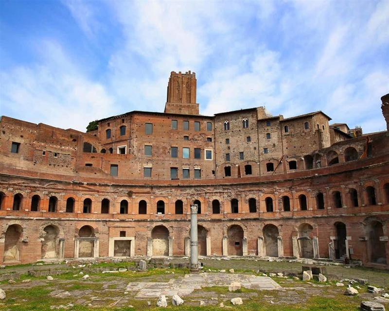 Select the Roman architectural structure that resembles the shopping malls of today-example-1