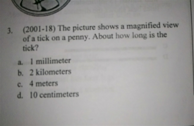 This picture shows a magnified view of a tick on a penny. about how long is the tick-example-1