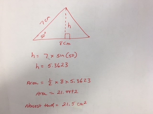 The figure shows the dimensions of a sail for a model boat. What is the area of this-example-1