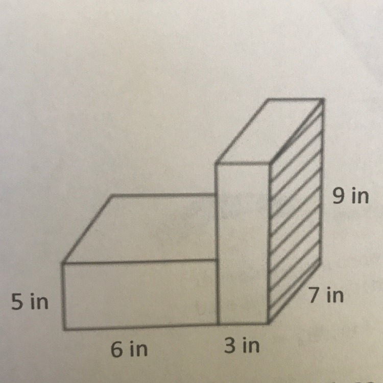 What is the the volume of the composite figure to the nearest whole number? The figure-example-1