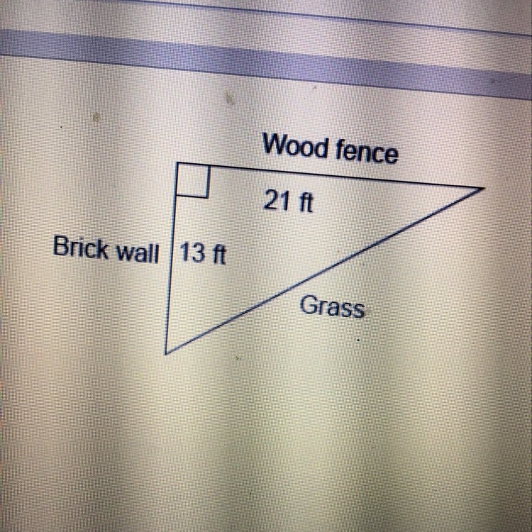 A garden in the shape of a right triangle is bordered on one side by a brick wall-example-1