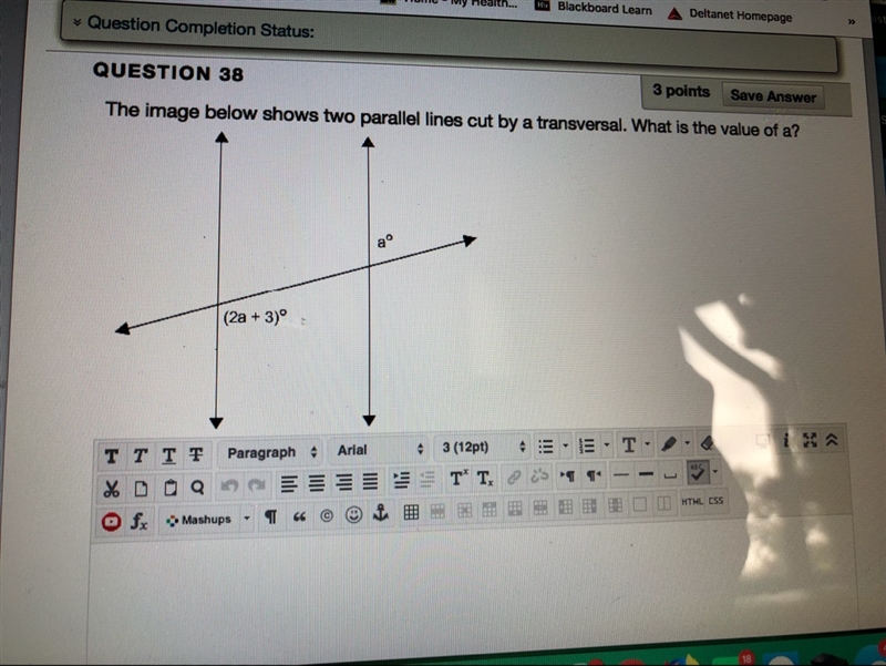 The image below shows two parallel lines cut by a transversal. What is the value of-example-1