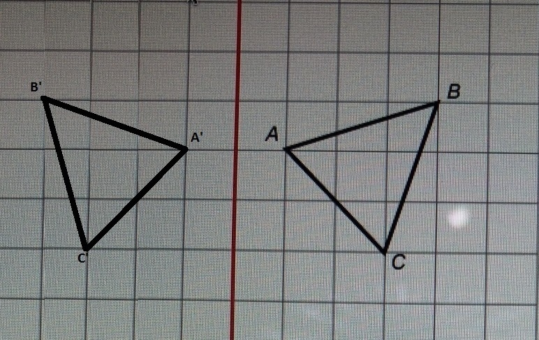 Triangle ABC is reflected over the line shown. Which statement is true of B?-example-1