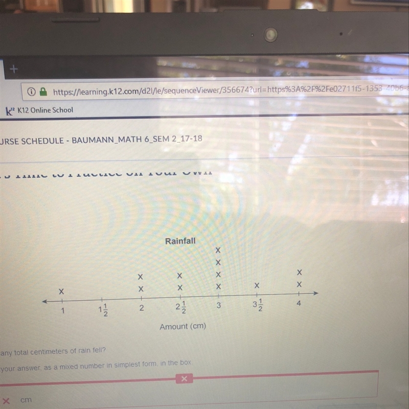 How many total centimeters of rain fell? Enter your answer as a mixed number in simplest-example-1