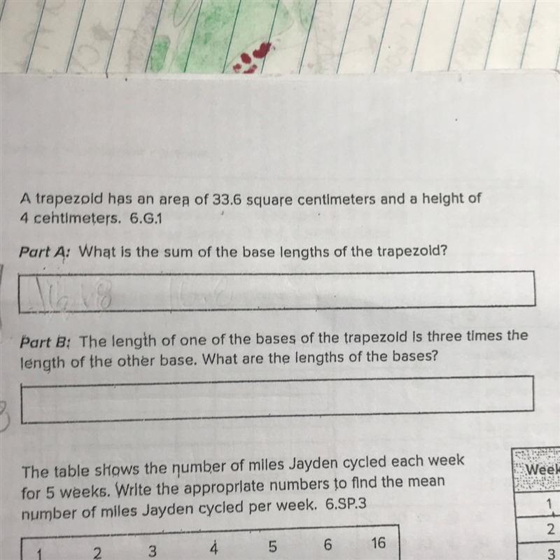 A trapezoid has an area of 33.6 square cm and a height of 4 centimeters.-example-1