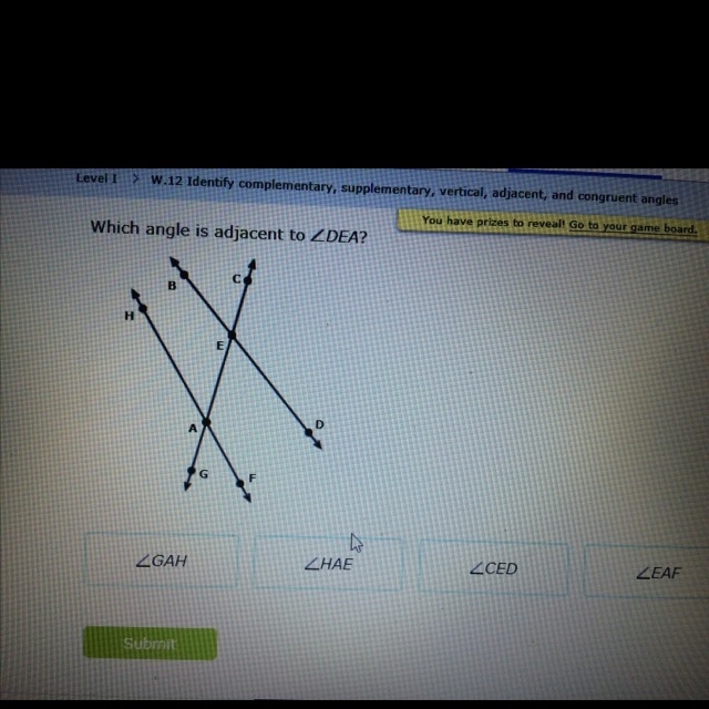 Which angle is adjacent to-example-1