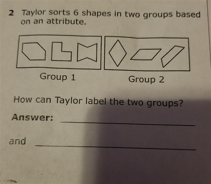 Taylor sorts 6 shapes in two groups based on attributes-example-1