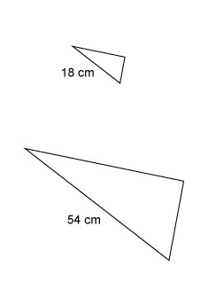 The triangles are similar. The area of the larger triangle is 603 cm². What is the-example-1