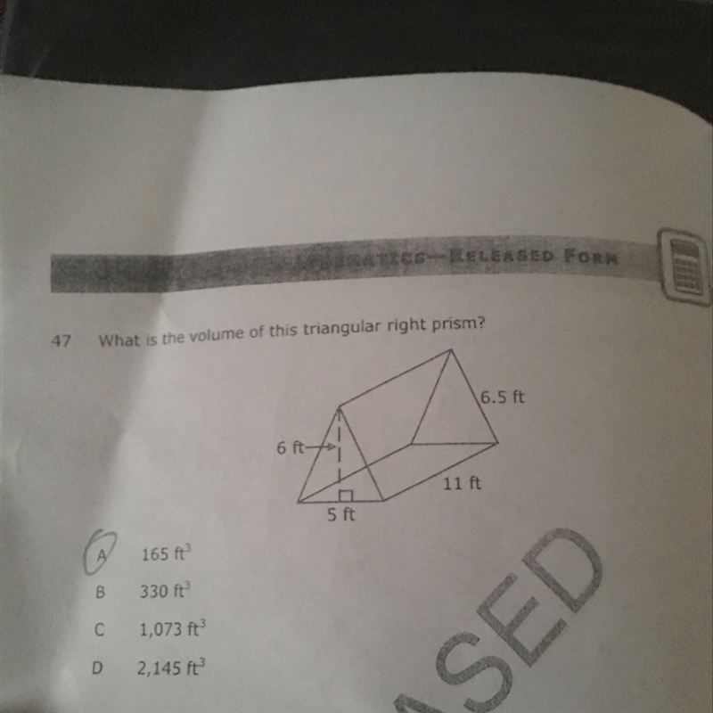 What is volume of this triangular right prism-example-1