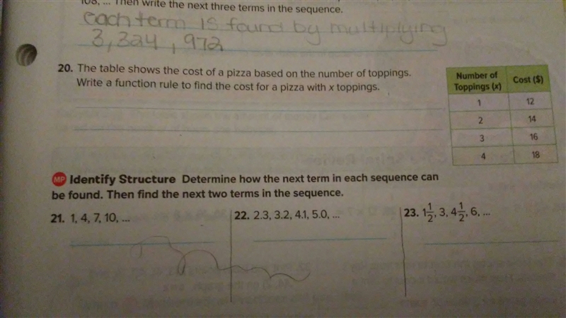 the table shows the cost of pizza based on the number of toppings .write a function-example-1