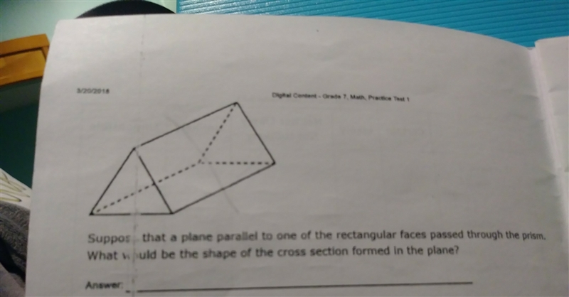 A triangular prism is shown below. Suppose that a plane parallel to one of the rectangular-example-1