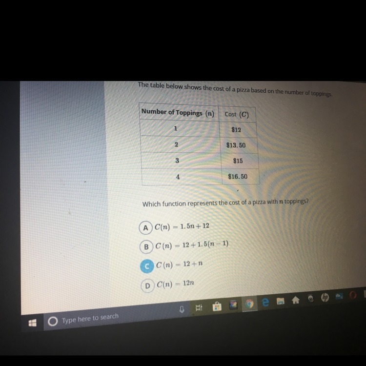 Which function represents the cost of a pizza with n Toppings-example-1