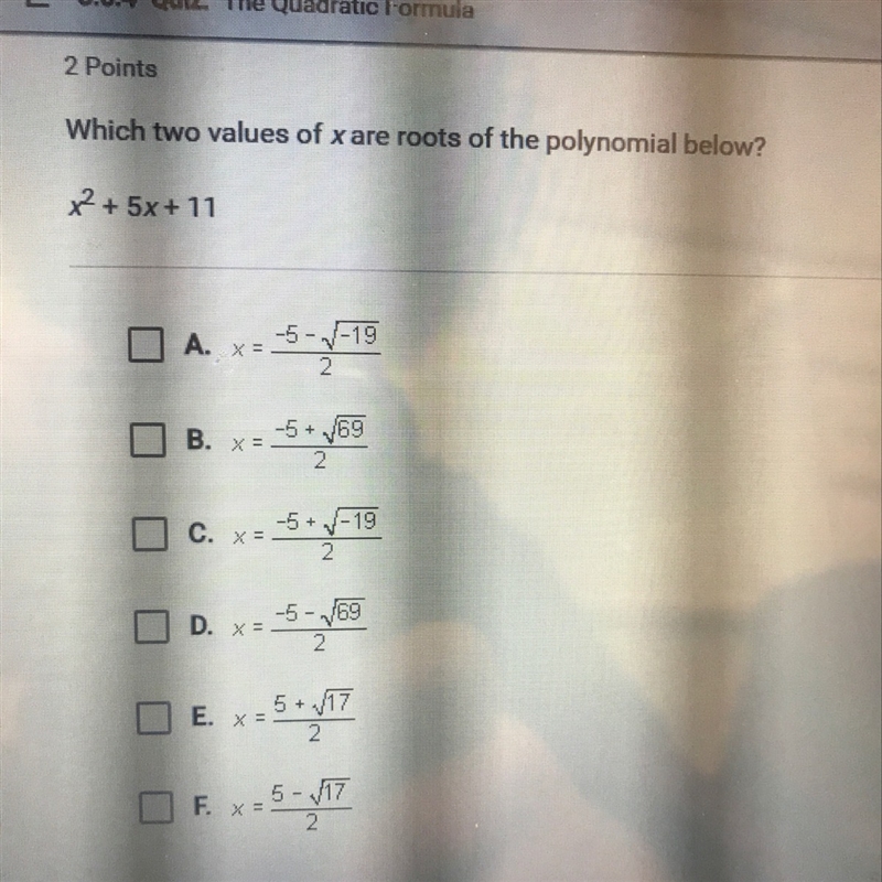 Which two values of x are roots of the polynomial below?-example-1