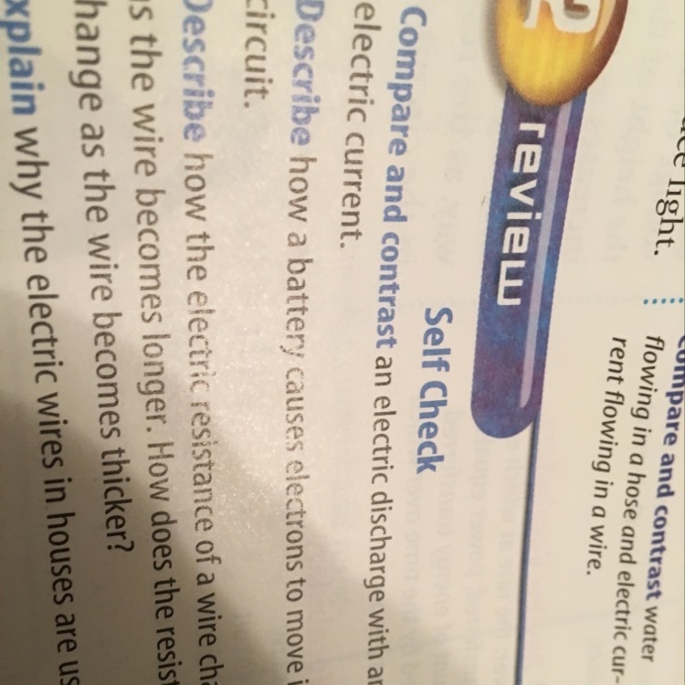 Compare and contrast an electric discharge with an electric current-example-1