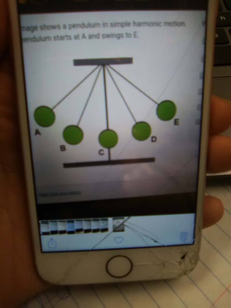 The image shows a pendulum in simple harmonic motion. The pendulum starts at A and-example-1