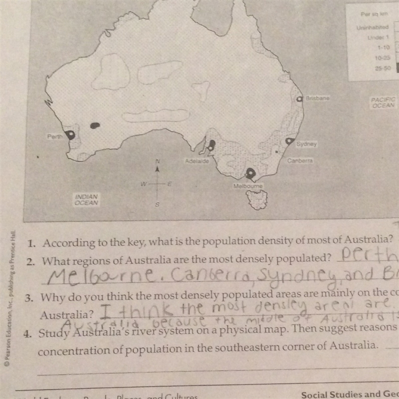 According to the key what is the population density most of Austalia-example-1