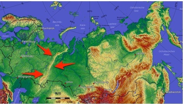 The red arrows are pointing to what geographic feature of Russia? A) Alps B) Himalayas-example-1