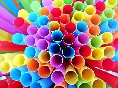 This image shows the tops of several multicolored straws. In what ways does this image-example-1