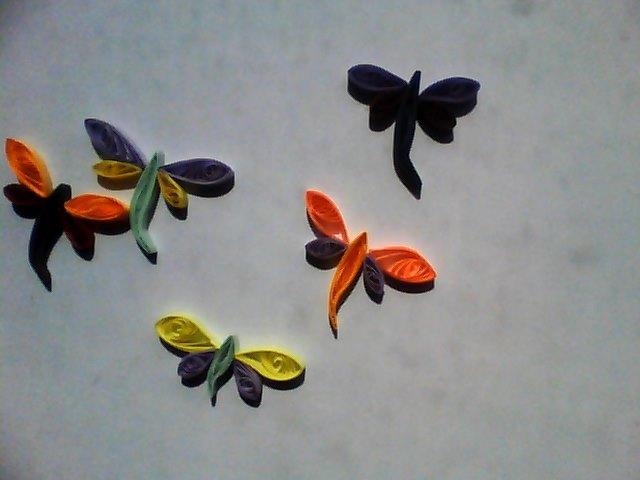 They don't look to good cause my camera is horrible, but look it up! Quilling Art-example-1