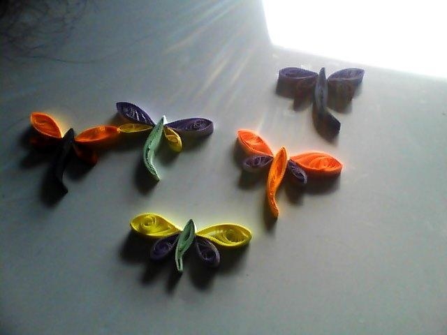 They don't look to good cause my camera is horrible, but look it up! Quilling Art-example-2