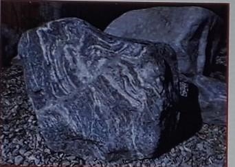 Igneous rocks can be formed from magma that solidifies deep beneath the earth's surface-example-1