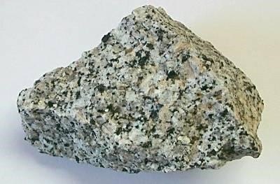 The primary minerals of an igneous rock you are examining are quartz, feldspar, and-example-1