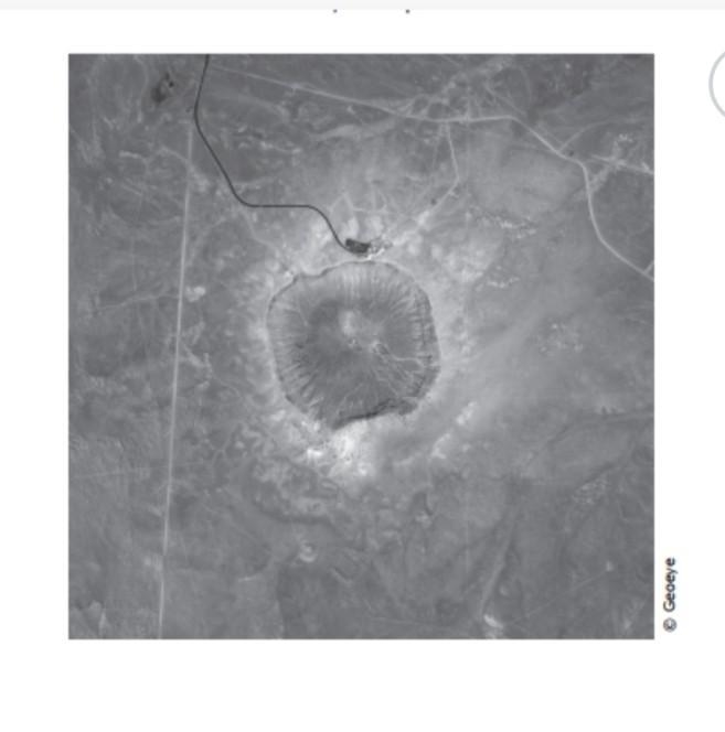 The satellite photograph above shows a large meteorite crater that is 1200 m in diameter-example-1