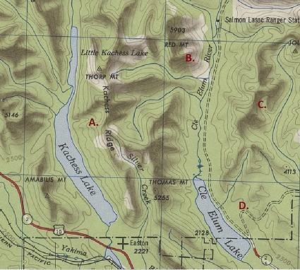 Take a look at the topographic map. Find letter B. Notice how the lines form rings-example-1