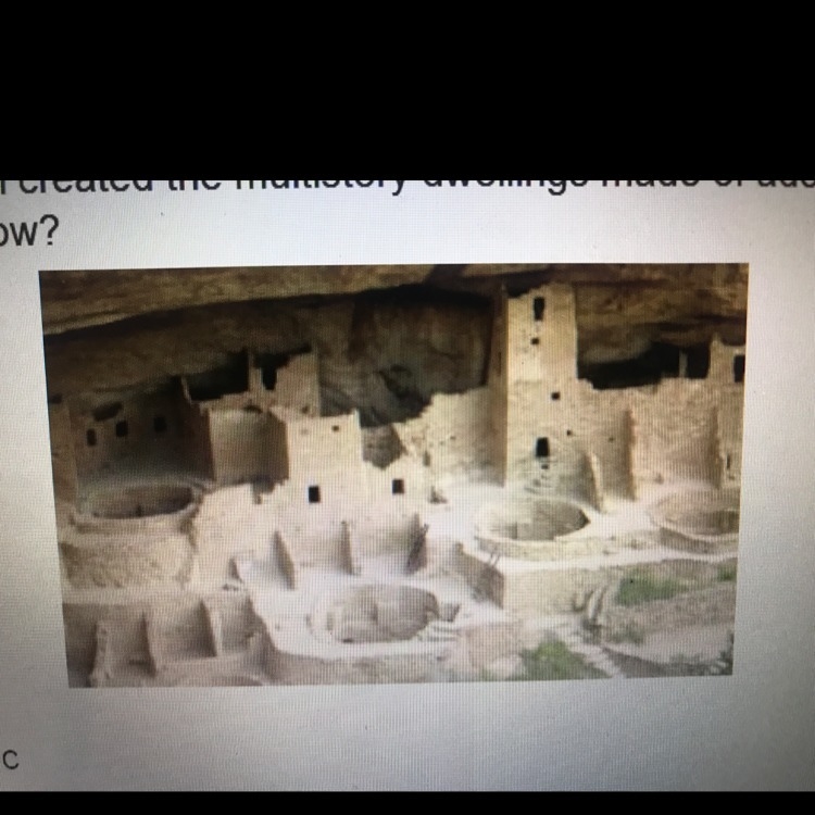 Which civilization created the multistory dwellings made of adobe and sand in the-example-1