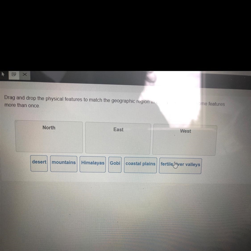 Drag and drop the physical features to match the geographic region in China. you will-example-1