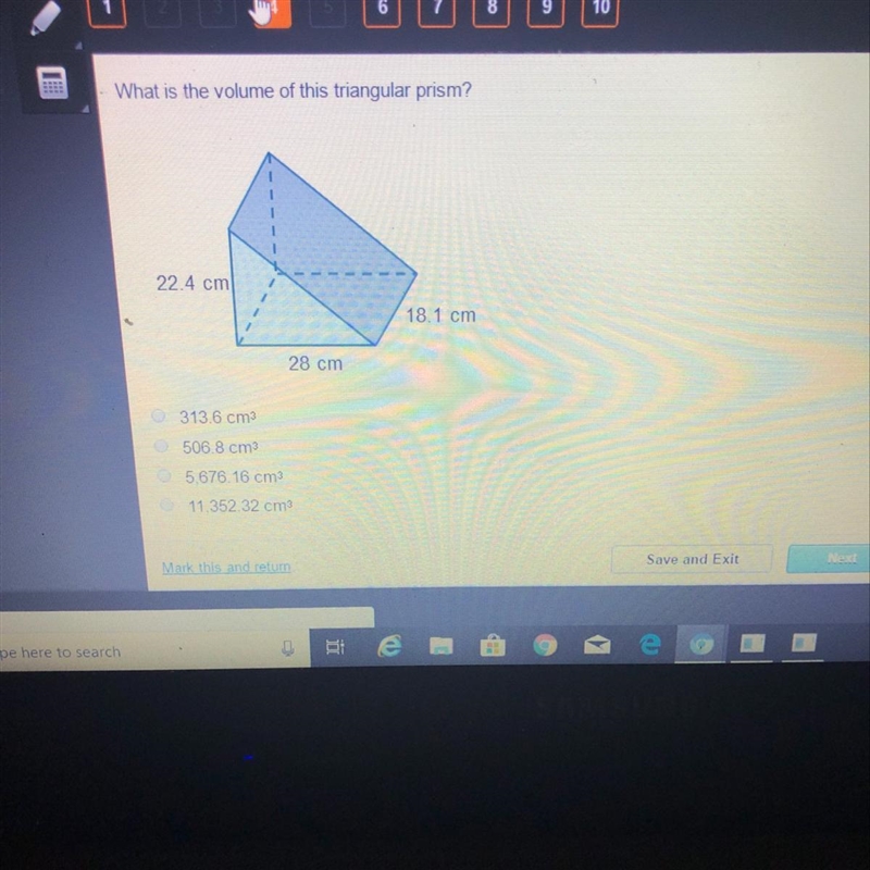 What is the volume of this triangular prism?-example-1