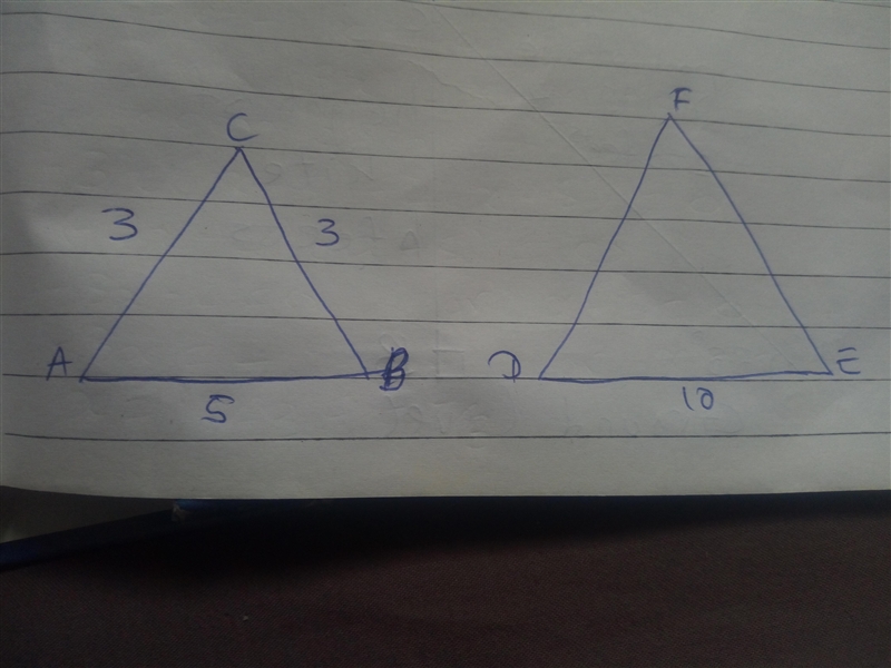 The base of an isosceles triangle is 5 and it's perimeter is 11. The base of a similar-example-1