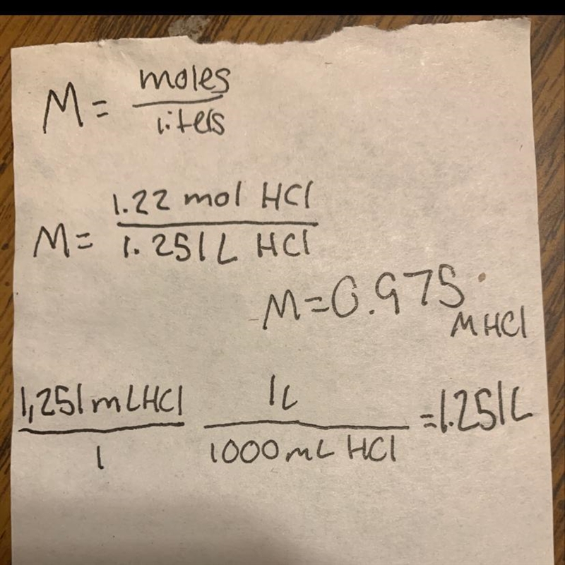 what is the molariry of a solution that contains 1.22 mol of hydrogen chloride if-example-1