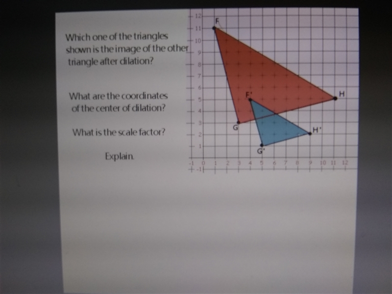 Which one of the triangles shown is the image of the other triangle after dilation-example-1